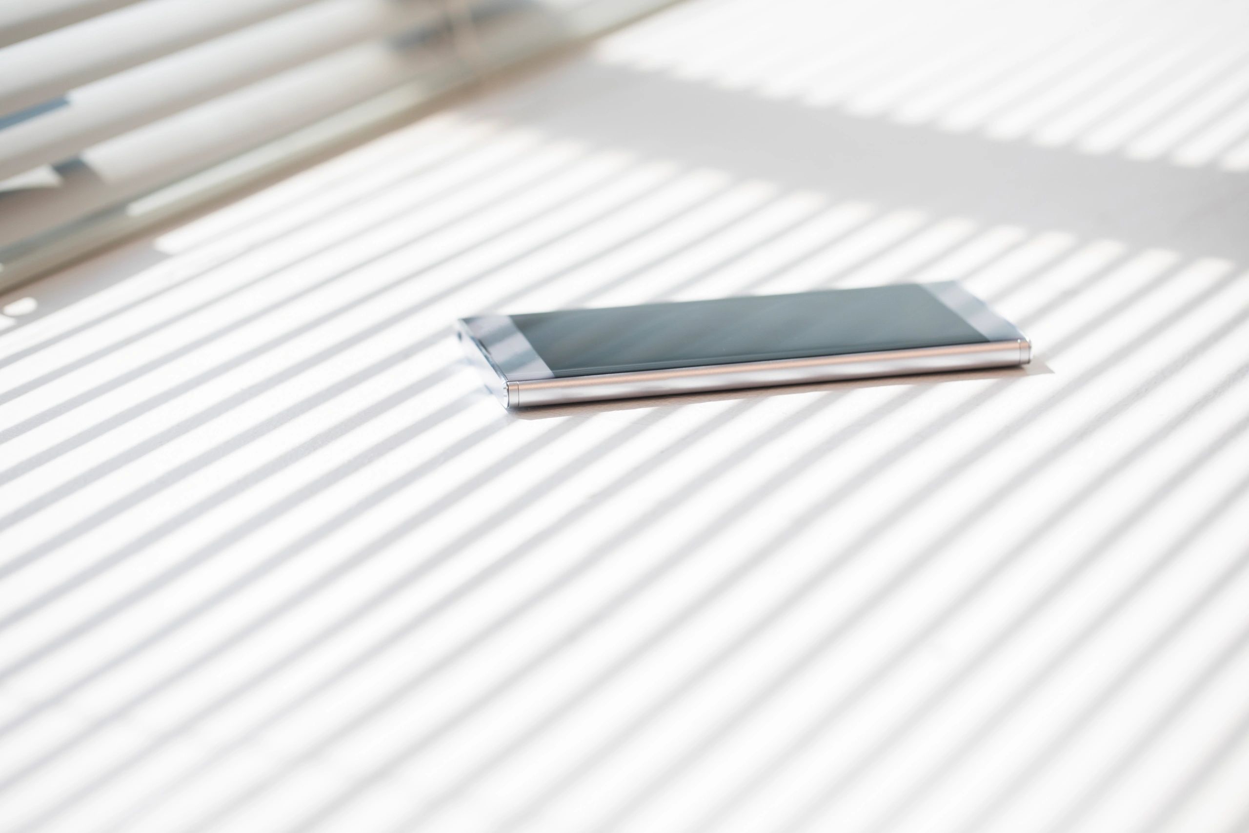 Smartphone on table in natural light